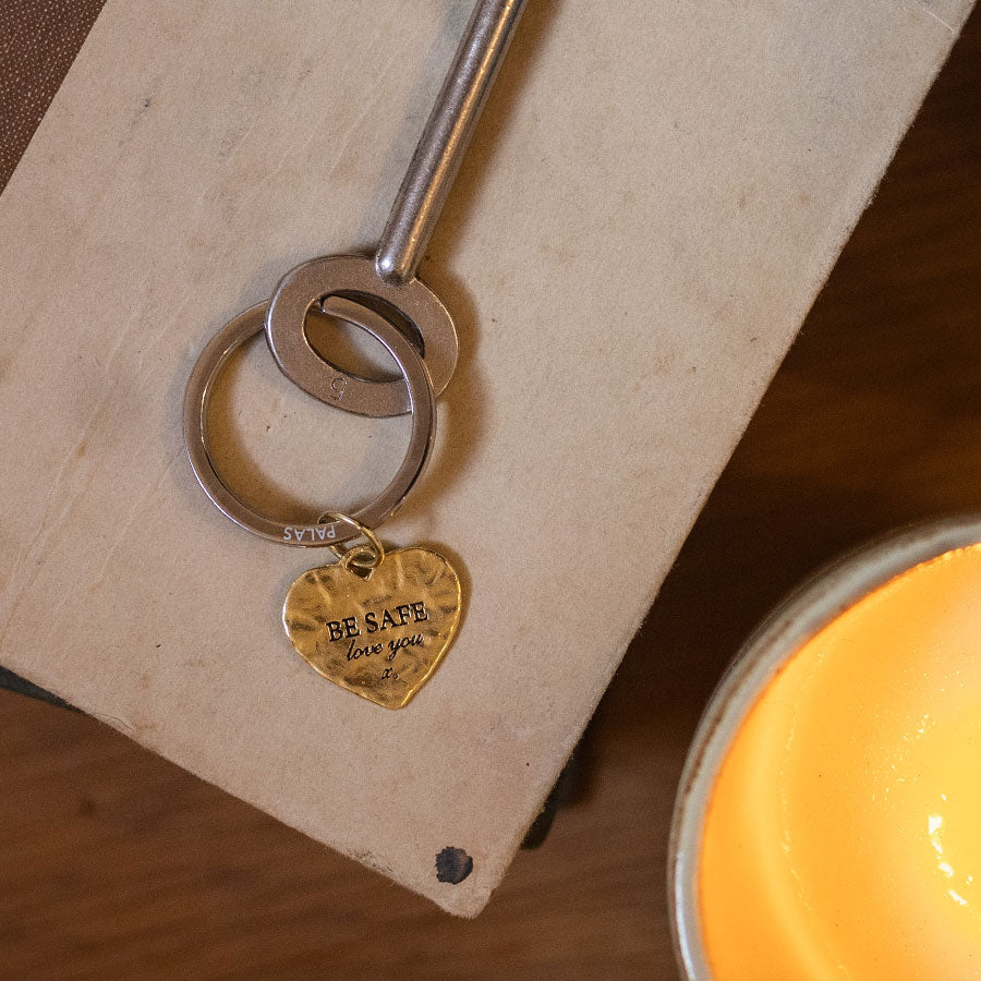 'Be safe' charm keyring
