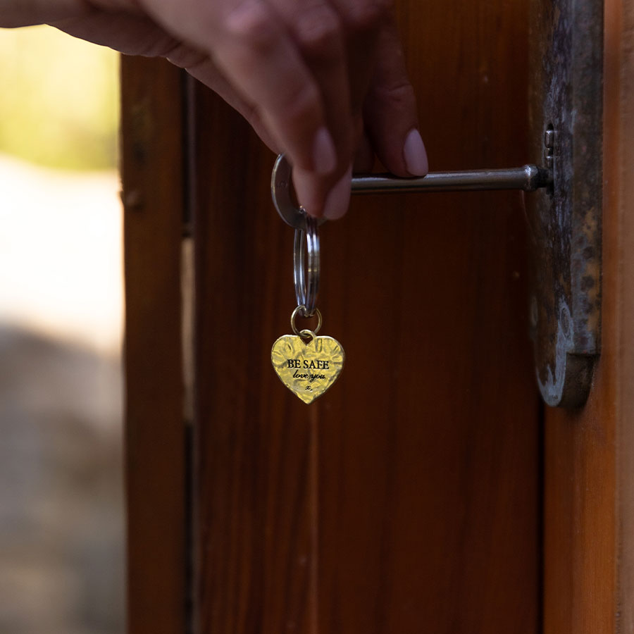'Be safe' charm keyring
