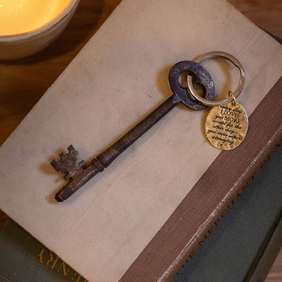 'Love you more' charm keyring