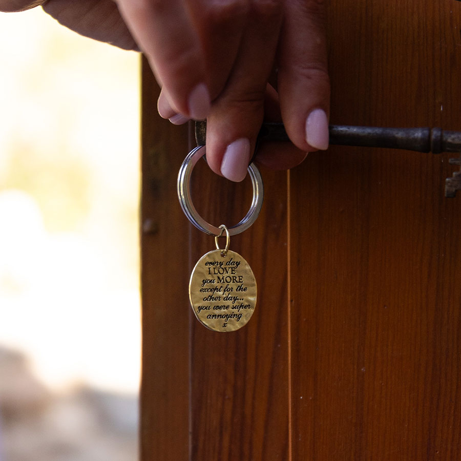 'Love you more' charm keyring