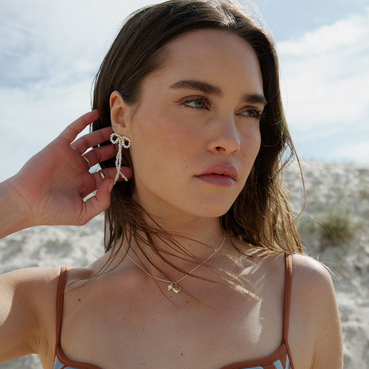 Tied with love bow pearl earrings