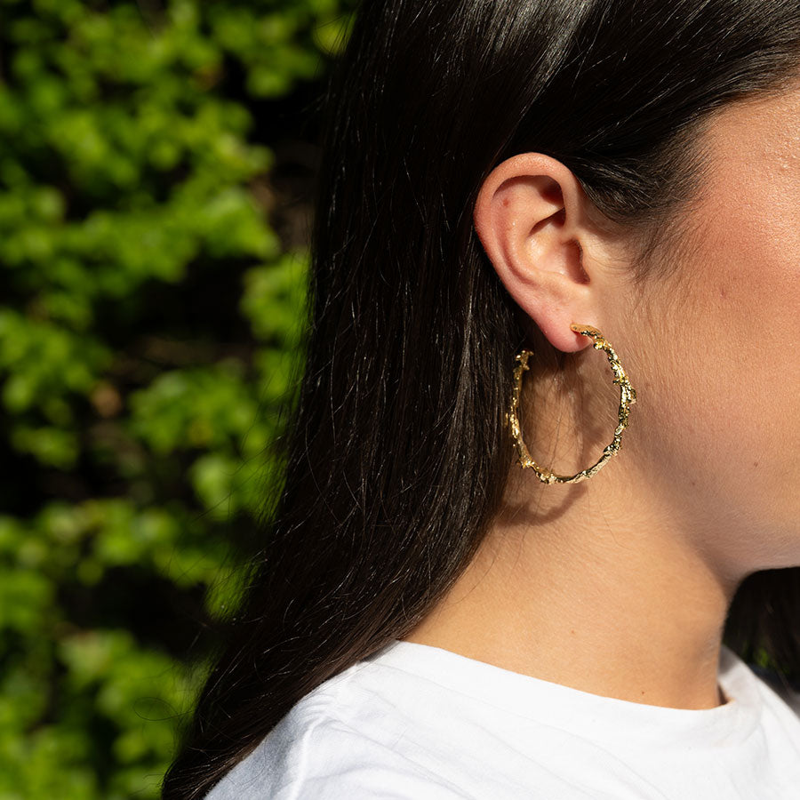 Coral protection hoop earrings