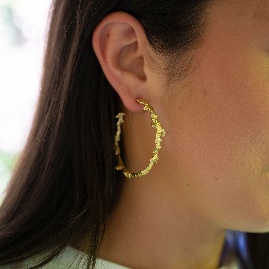 Coral protection hoop earrings