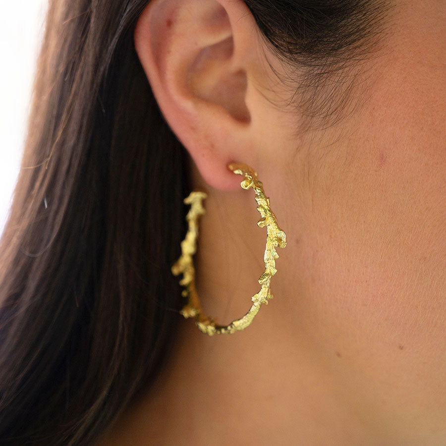 Coral protection hoop earrings