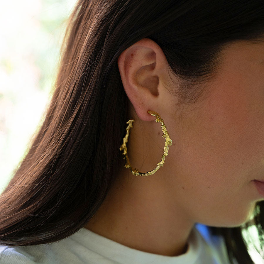 Coral protection hoop earrings