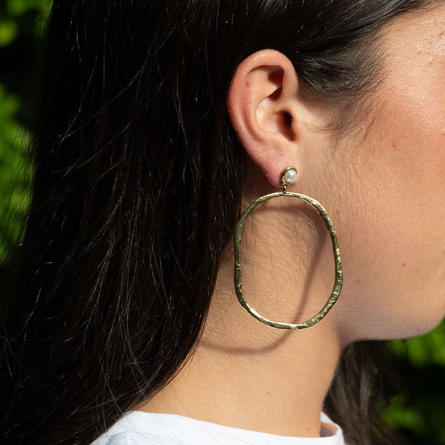 Lunar pearl oval hoop earrings