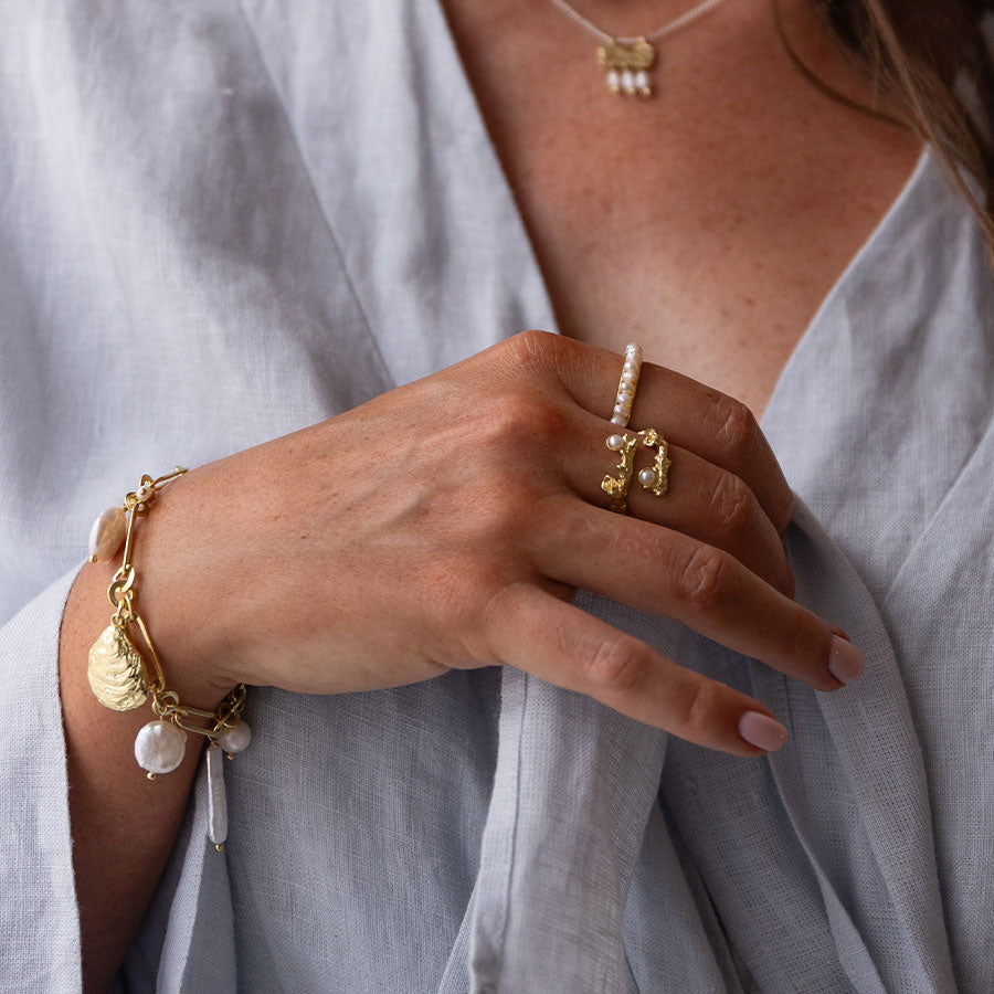 The world is your oyster pearl charm bracelet