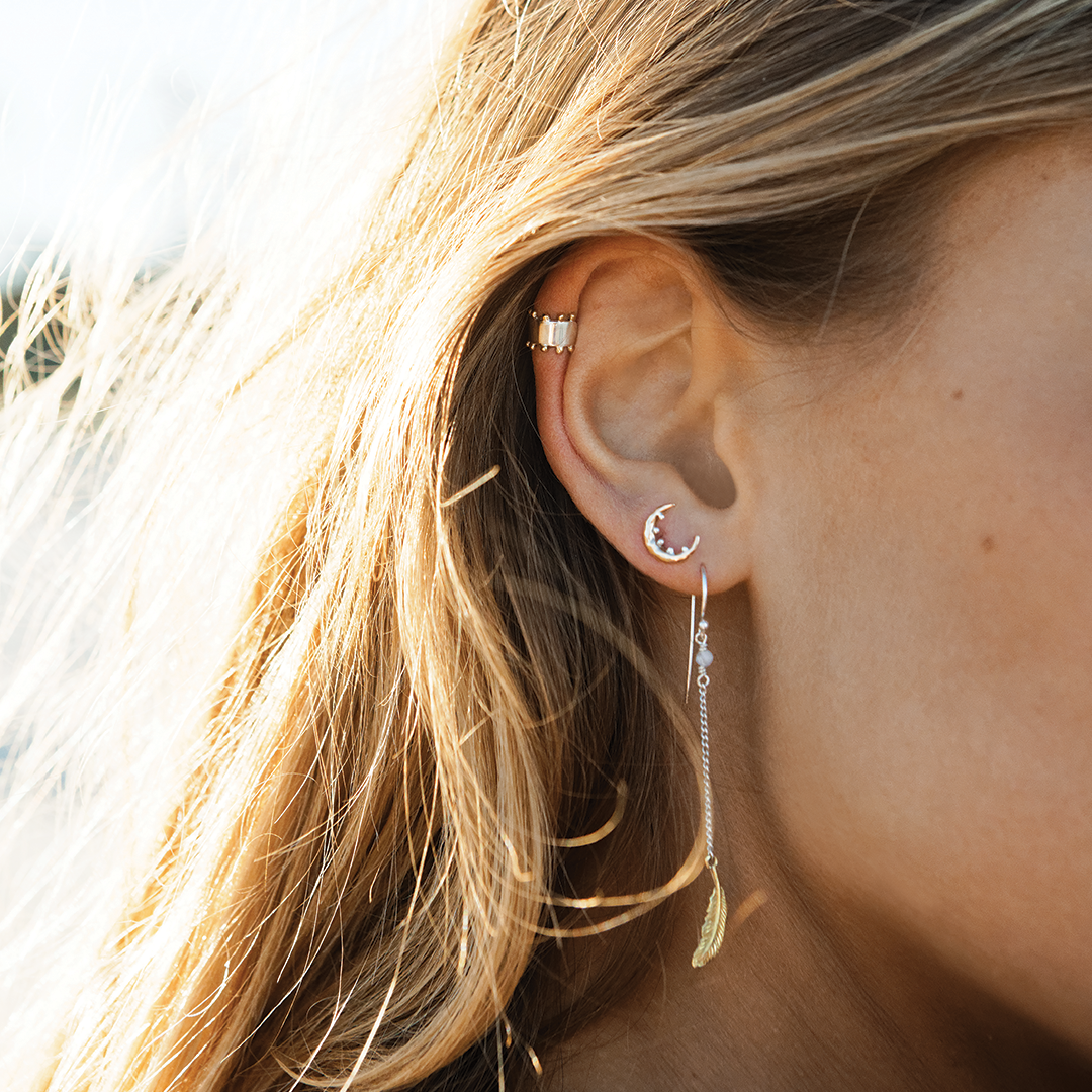 Feather and crystal quartz earrings