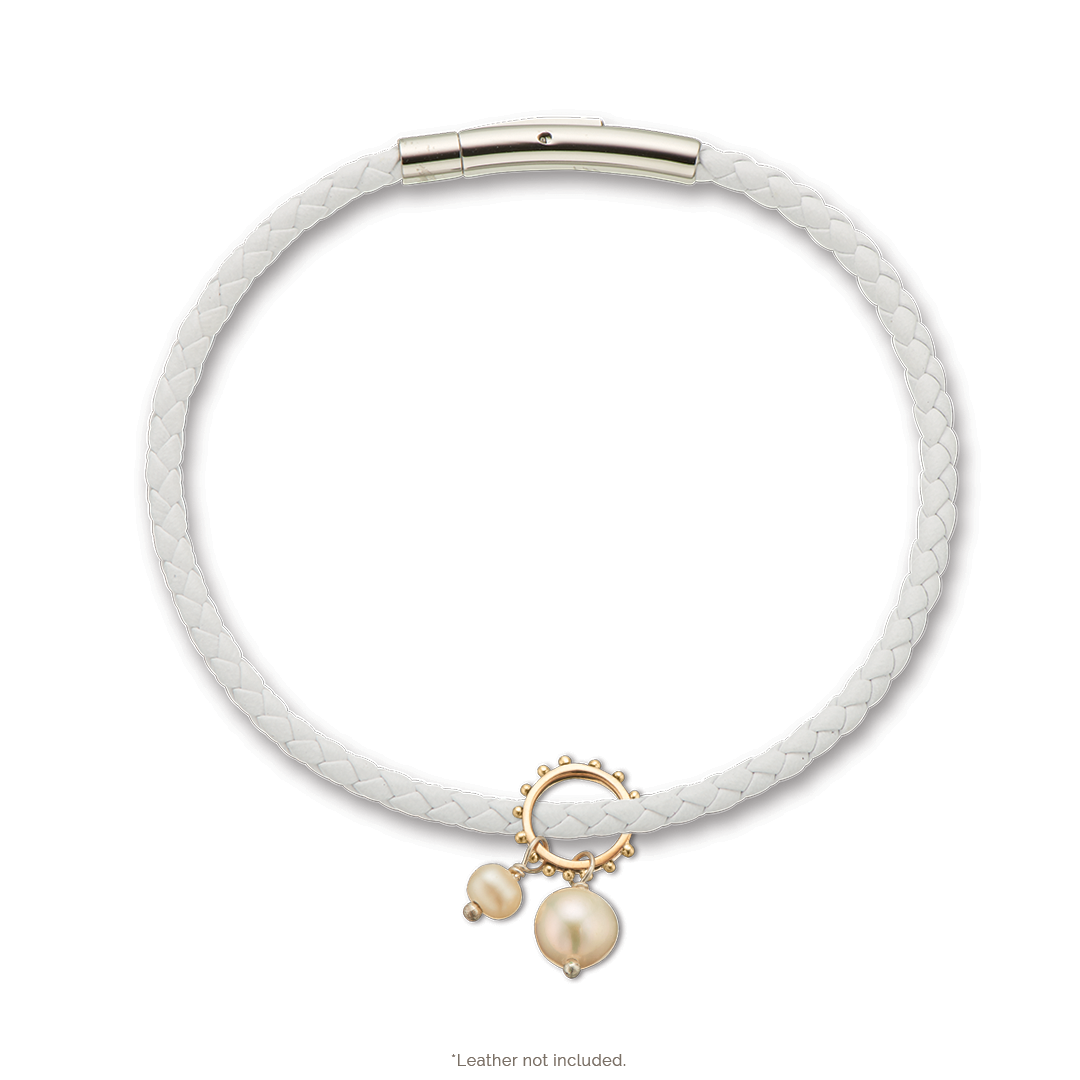 Double pearl charm on ring