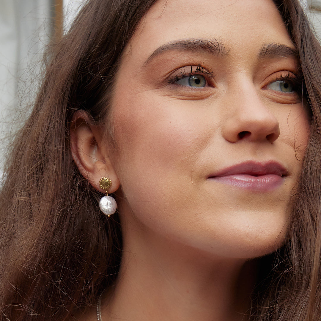 Golden sun and moon pearl earrings