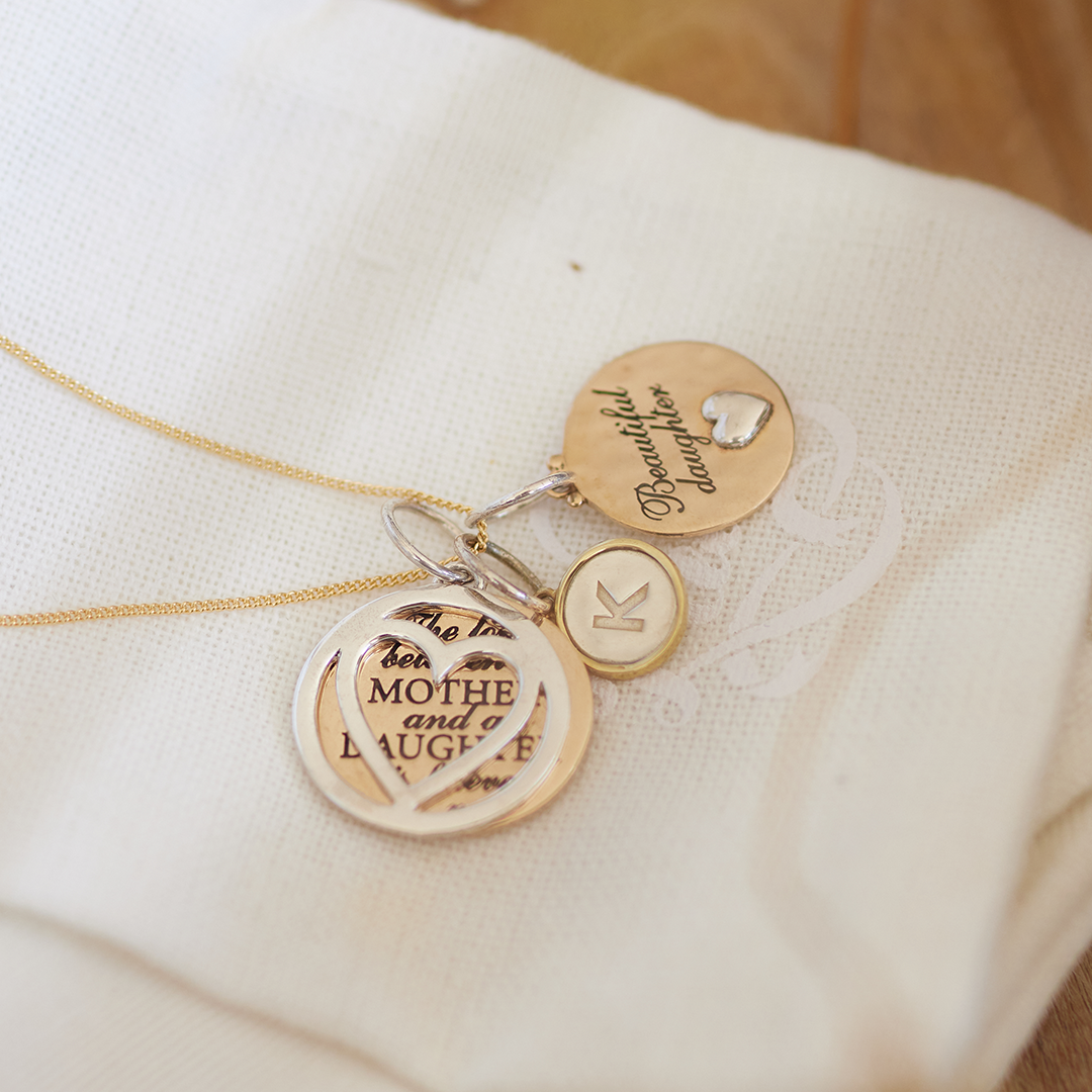 Love between mother & daughter heart slider charm