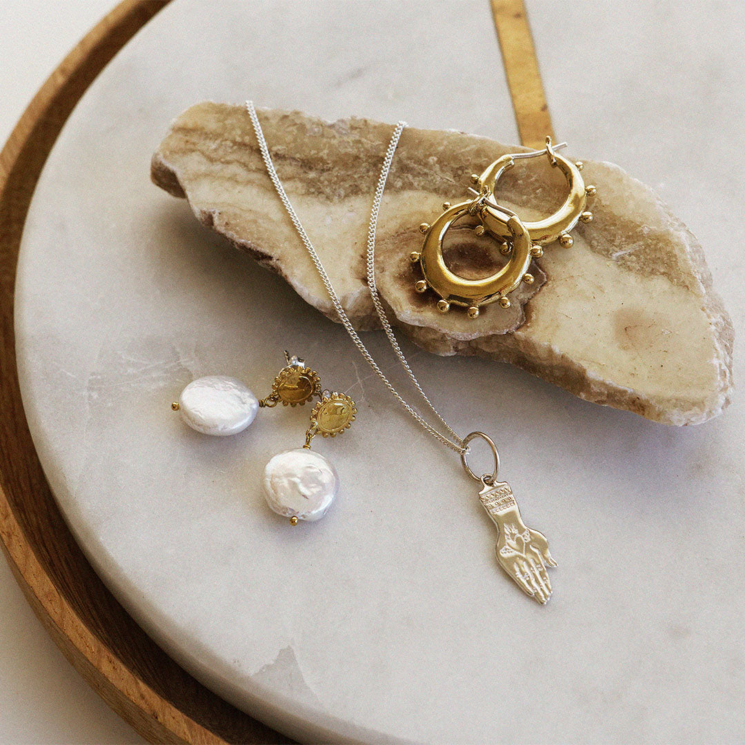 Golden sun and moon pearl earrings