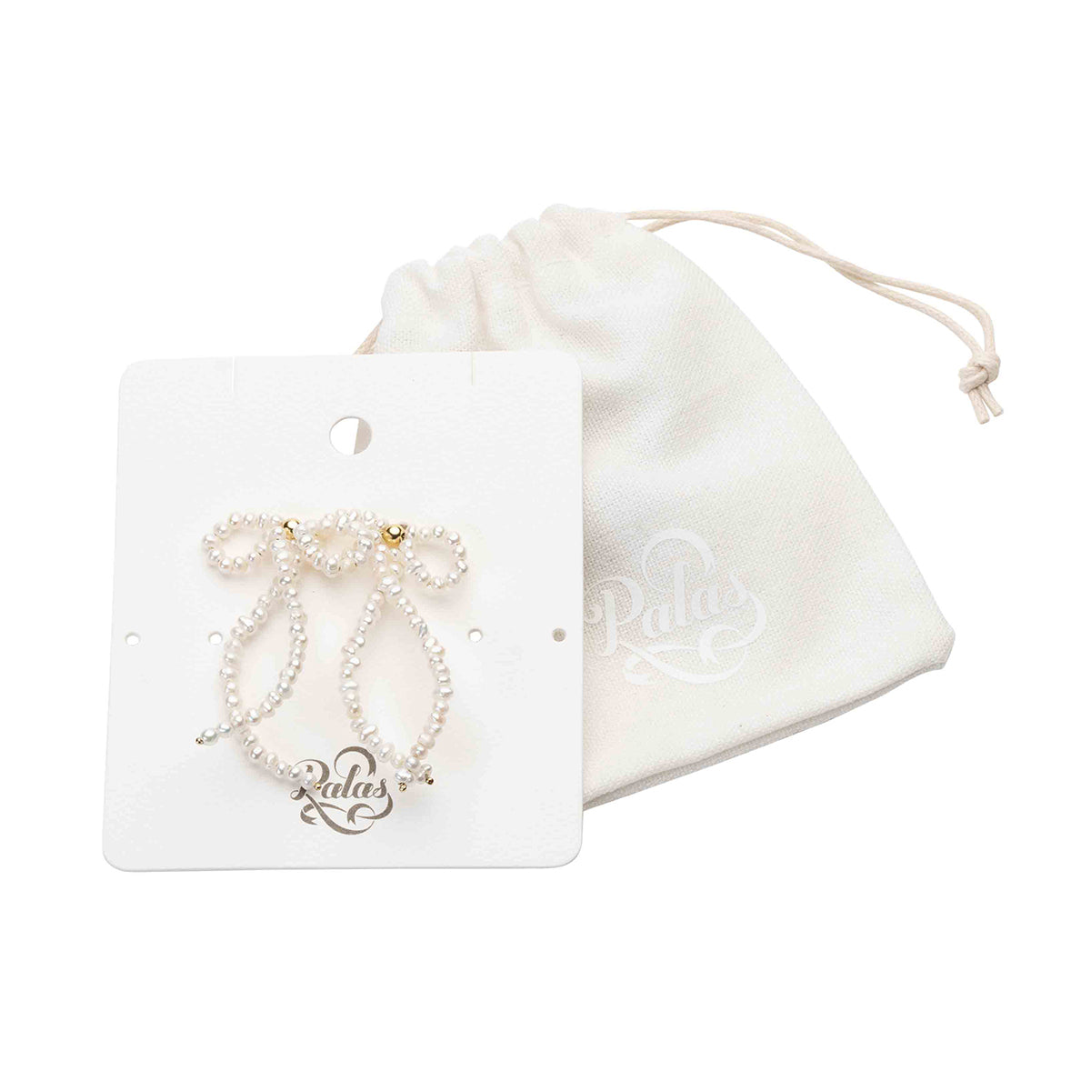 Tied with love bow pearl earrings