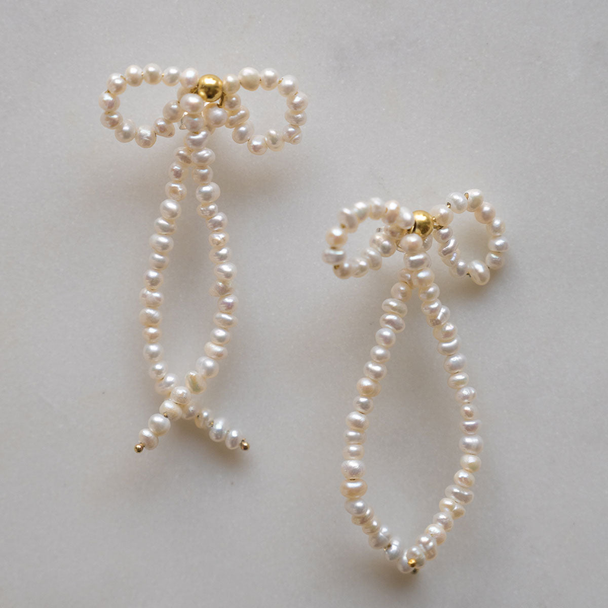 Tied with love bow pearl earrings