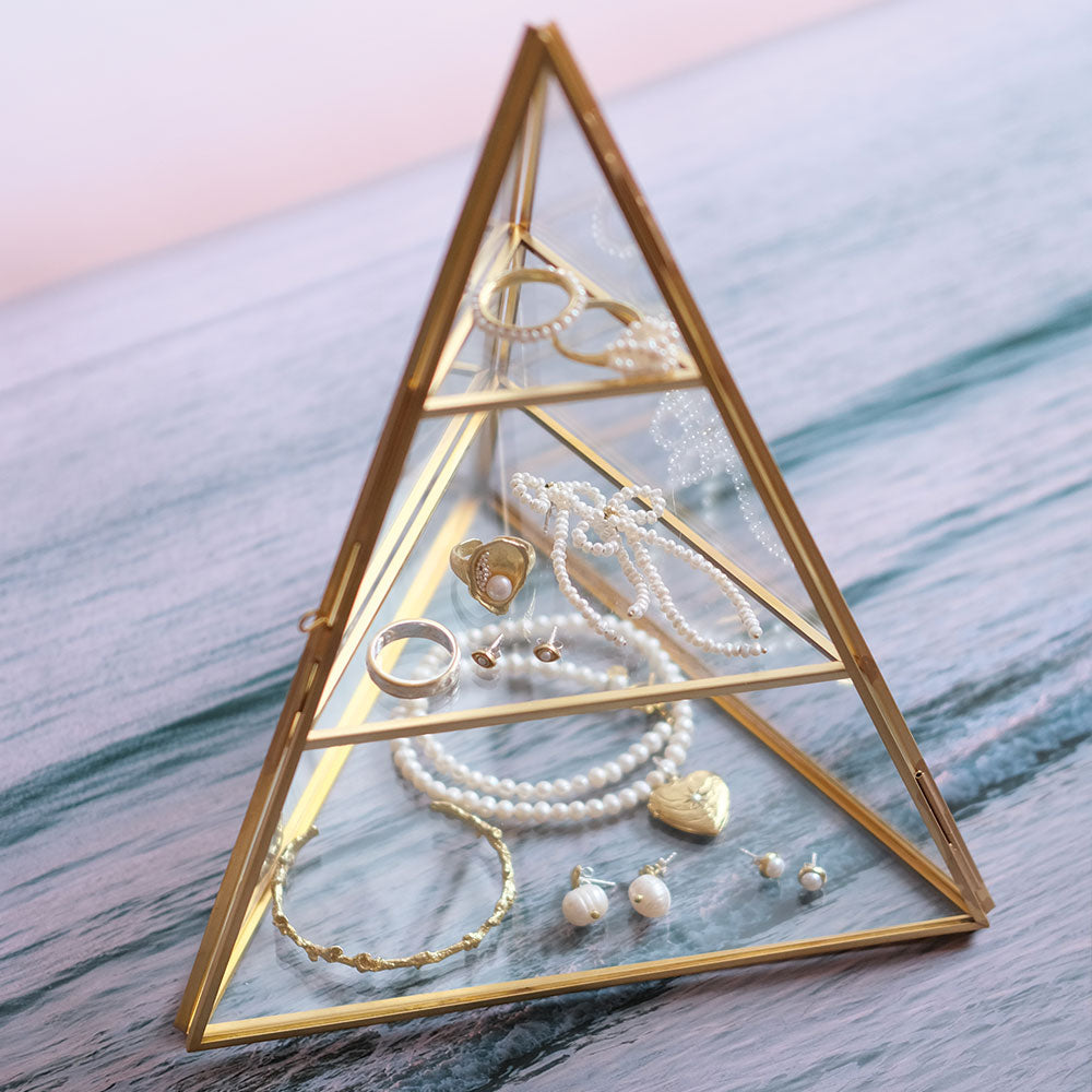 Brass and glass pyramid display case