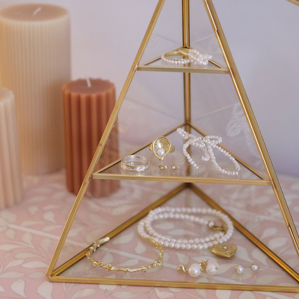 Brass and glass pyramid display case