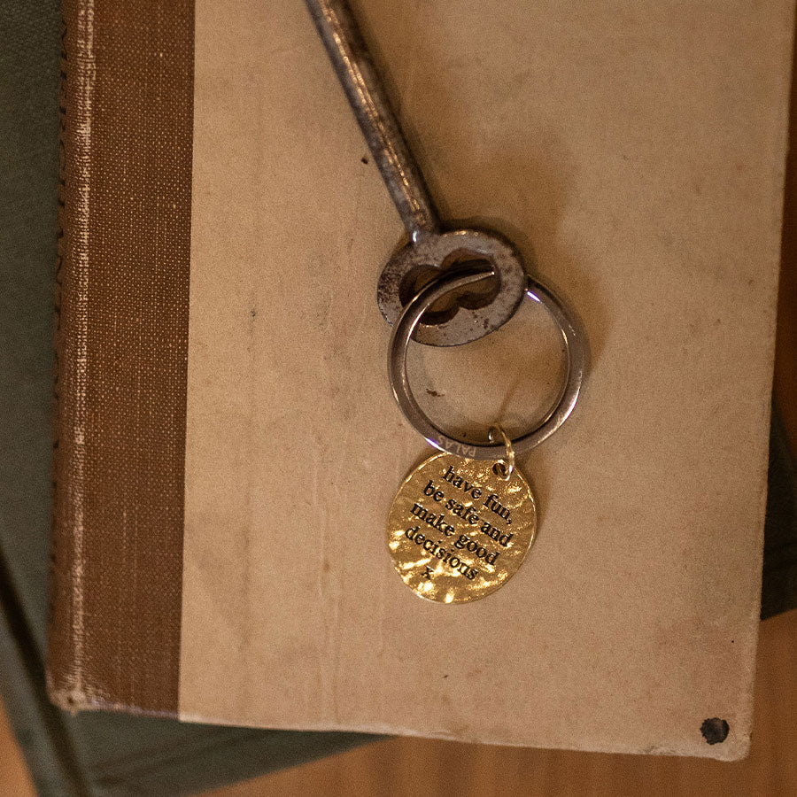 'Good decisions' charm keyring