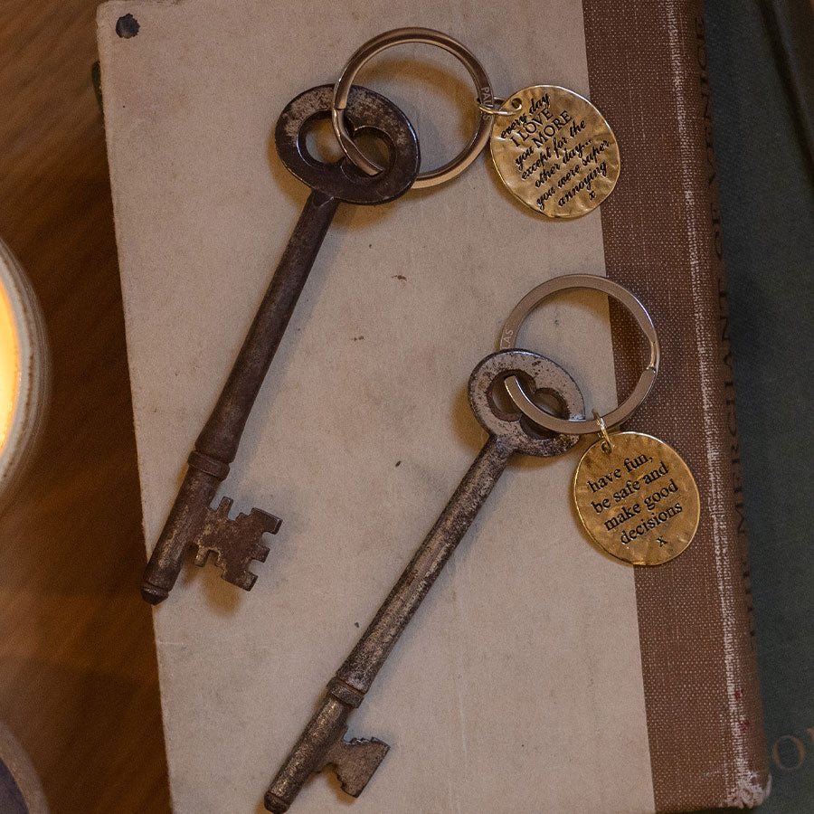 'Good decisions' charm keyring