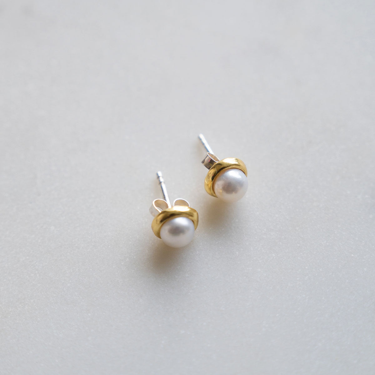 Lunar pearl stud earrings