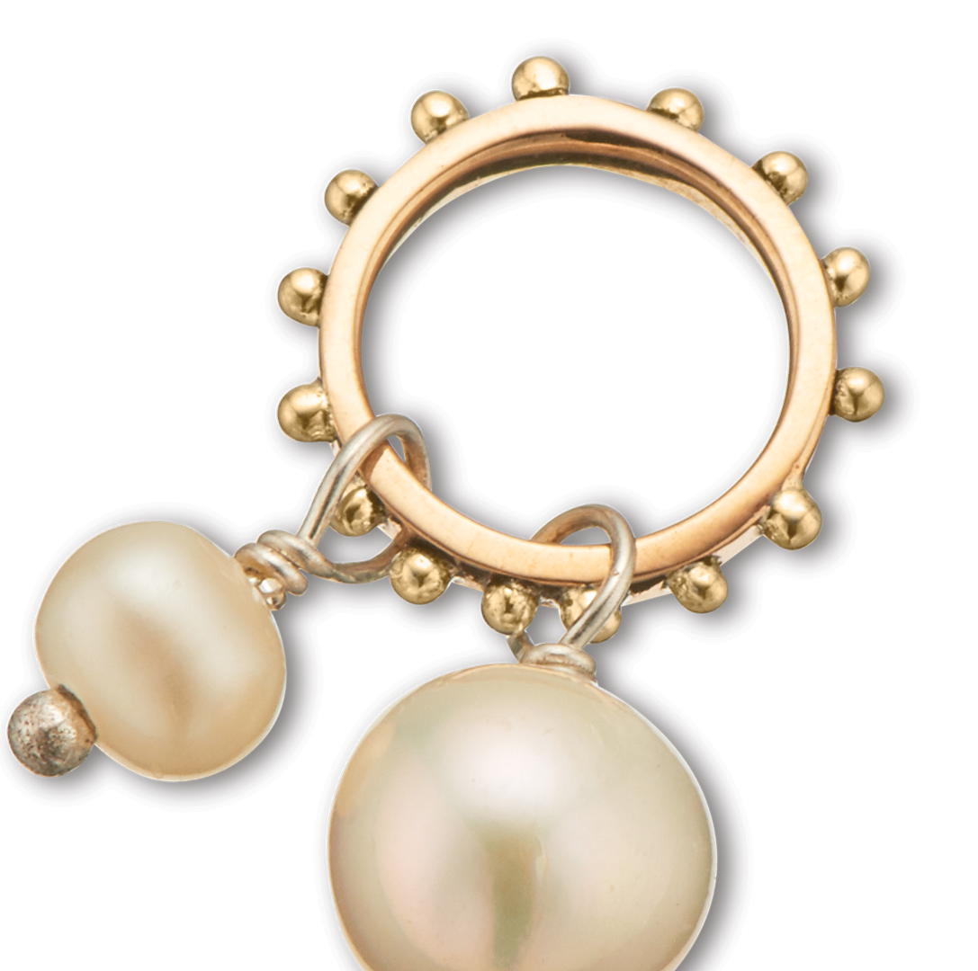Double pearl charm on ring